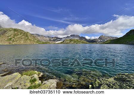 "Grosser Schwarzsee lake or Lago Nero, Schneeberger Weisse Mountain at the rear, Stubai Alps, Tyrol, Austria, Europe" View Large Photo Image Stock Image - "Grosser Schwarzsee lake or Lago Nero, Schneeberger Weisse Mountain at the rear, Stubai Alps, Tyrol, Austria, Europe". Fotosearch