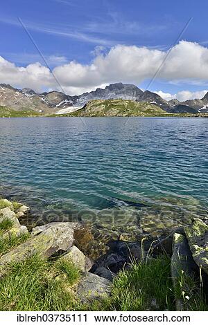 "Grosser Schwarzsee lake or Lago Nero, Schneeberger Weisse Mountain at the rear, Stubai Alps, Tyrol, Austria, Europe" View Large Photo Image Stock Image - "Grosser Schwarzsee lake or Lago Nero, Schneeberger Weisse Mountain at the rear, Stubai Alps, Tyrol, Austria, Europe". Fotosearch