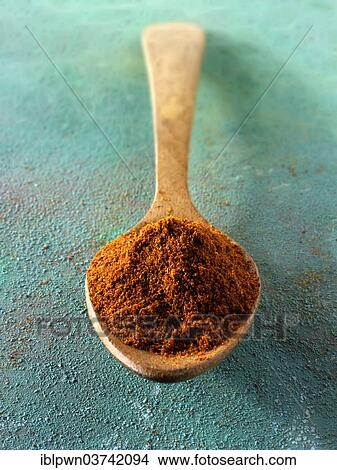 Ground chili on a wooden spoon View Large Photo Image Picture - Ground chili on a wooden spoon. Fotosearch