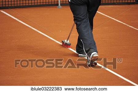 "Groundsman cleans the lines on a tennis court, clay tennis court, Bavaria, Germany, Europe" View Large Photo Image Stock Image - "Groundsman cleans the lines on a tennis court, clay tennis court, Bavaria, Germany, Europe". Fotosearch