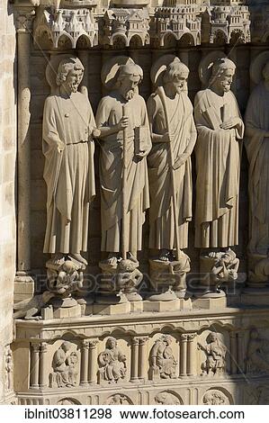 Stock Photo - "Group of figures on the facade of Cathedrale Notre Dame, Paris, Ile-de-France, France, Europe". Fotosearch