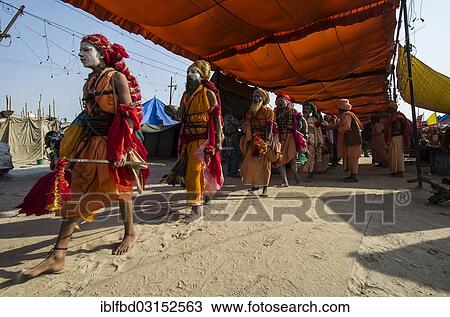 "Group of Gudar Sadhus, holy men, walking in a row and collecting offered food from fellow sadhus, at the Sangam, the confluence of the rivers Ganges, Yamuna and Saraswati, during Kumbha Mela festival, Allahabad, Uttar Pradesh, India, Asia" View Large Photo Image Stock Image - "Group of Gudar Sadhus, holy men, walking in a row and collecting offered food from fellow sadhus, at the Sangam, the confluence of the rivers Ganges, Yamuna and Saraswati, during Kumbha Mela festival, Allahabad, Uttar Pradesh, India, Asia". Fotosearch