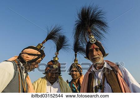 Picture - "Group of Jangam Sadhus, holy men, at the Sangam, the confluence of the rivers Ganges, Yamuna and Saraswati, during Kumbha Mela festival, Allahabad, Uttar Pradesh, India, Asia". Fotosearch