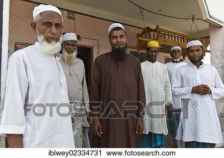 "Group of Muslim men standing in front of a mosque, Gabura, Sundabarns, Khulna District, Bangladesh, South Asia, Asia" View Large Photo Image Stock Image - "Group of Muslim men standing in front of a mosque, Gabura, Sundabarns, Khulna District, Bangladesh, South Asia, Asia". Fotosearch