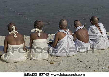 "Group of new Jain nuns sitting at the banks of the river Ganges during their initiation, during Kumbha Mela festival, Allahabad, Uttar Pradesh, India, Asia" View Large Photo Image Stock Image - "Group of new Jain nuns sitting at the banks of the river Ganges during their initiation, during Kumbha Mela festival, Allahabad, Uttar Pradesh, India, Asia". Fotosearch