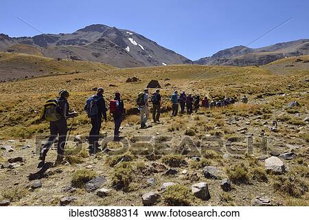 "Group of people hiking on Hesarshal plateau, Takht-e Suleyman Massif, Alborz Mountains, Mazandaran Province, Persia, Iran, Asia" View Large Photo Image Picture - "Group of people hiking on Hesarshal plateau, Takht-e Suleyman Massif, Alborz Mountains, Mazandaran Province, Persia, Iran, Asia". Fotosearch