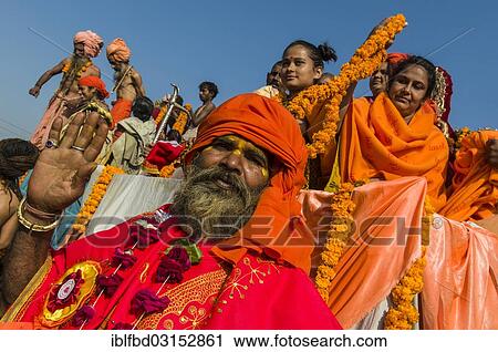 Stock Image - "Group of sadhus, holy men, and sadhvis, holy women, participating in the procession of Shahi Snan, the royal bath, during Kumbha Mela festival, Allahabad, Uttar Pradesh, India, Asia". Fotosearch