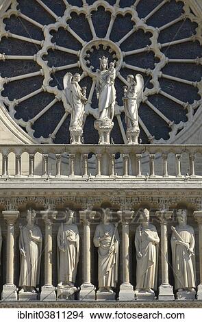 Picture - "Group of sculptures and rosette of the church window, Cathedrale Notre Dame, Paris, Ile-de-France, France, Europe". Fotosearch