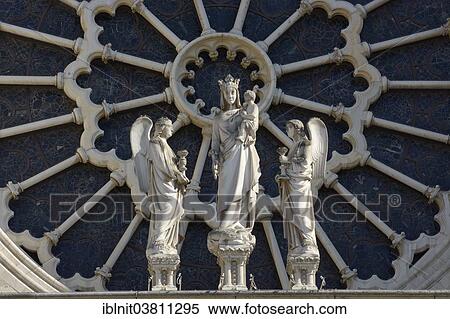 Stock Photography - "Group of sculptures and rosette of the church window, Cathedrale Notre Dame, Paris, Ile-de-France, France, Europe". Fotosearch