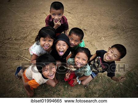 "Group of smiling children in Laos, Southeast Asia, Asia" View Large Photo Image Stock Photography - "Group of smiling children in Laos, Southeast Asia, Asia". Fotosearch