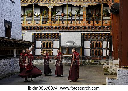 "Group of young monks practicing a religious dance in the courtyard of Mongar Dzong fortress, Mongar, Mongar District, Bhutan, Asia" View Large Photo Image Picture - "Group of young monks practicing a religious dance in the courtyard of Mongar Dzong fortress, Mongar, Mongar District, Bhutan, Asia". Fotosearch