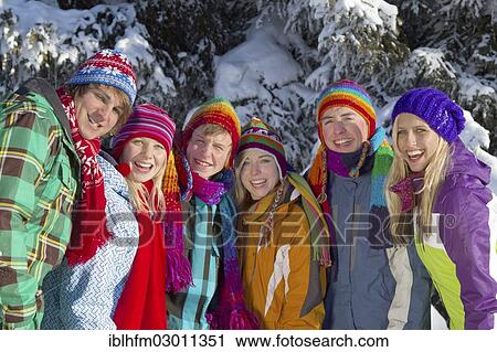 "Group of young people in front of a snow-covered spruce forest, Salzburger Land, Flachau, Tyrol, Austria, Europe" View Large Photo Image Stock Image - "Group of young people in front of a snow-covered spruce forest, Salzburger Land, Flachau, Tyrol, Austria, Europe". Fotosearch