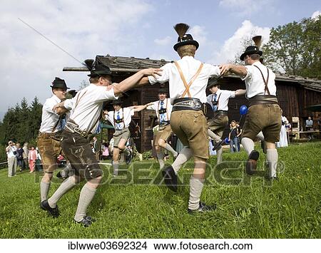 "Group wearing traditional clothing, folk dancing, smoke house, open air museum, Mondsee, Salzkammergut, Austria, Europe" View Large Photo Image Picture - "Group wearing traditional clothing, folk dancing, smoke house, open air museum, Mondsee, Salzkammergut, Austria, Europe". Fotosearch