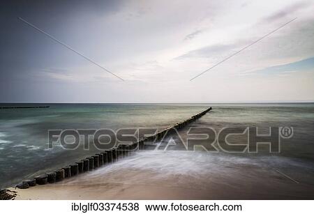 Stock Photo - "Groynes on the Baltic Sea coast, Wustrow, Mecklenburg-Western Pomerania, Germany, Europe". Fotosearch