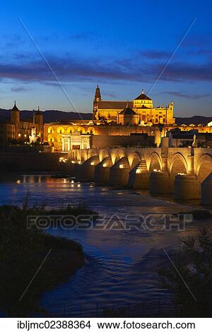 Picture - "Guadalquivir river, Roman bridge and mosque-cathedral at dusk, Cordoba, Andalusia, Spain, Europe". Fotosearch