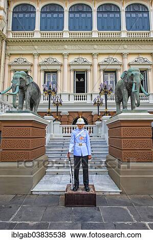 Stock Photo - "Guard in front of the Chakri Maha Prasat Hall, Grand Palace, Bangkok, Thailand, Asia". Fotosearch