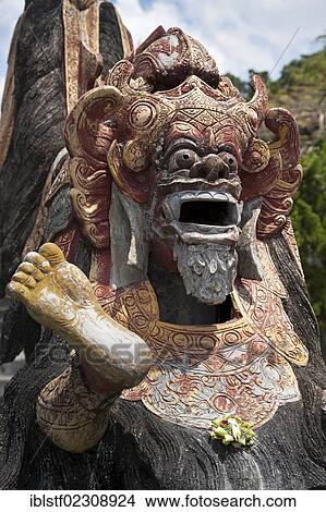 Picture - "Guardian figure with a sacrifice, Hinduism, Bali, Indonesia, Southeast Asia, Asia". Fotosearch
