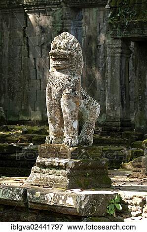 Stock Photo - "Guardian lion made of stone at the East Gate, Preah Khan Temple, built by King Jayavarman VII, 12th century, Angkor, Cambodia, Southeast Asia, Asia". Fotosearch