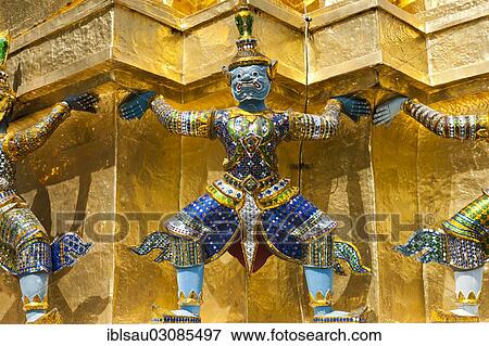 "Guardian statue at the base of a golden chedi, Wat Phra Kaeo or Wat Phra Kaew Temple, Royal Palace, Grosser Palast, Grand Palace, Bangkok, Central Thailand, Thailand, Asia" View Large Photo Image Stock Photo - "Guardian statue at the base of a golden chedi, Wat Phra Kaeo or Wat Phra Kaew Temple, Royal Palace, Grosser Palast, Grand Palace, Bangkok, Central Thailand, Thailand, Asia". Fotosearch