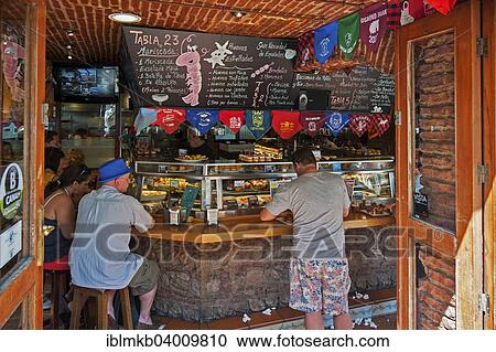 "Guests at the Cava Aragonesa tapas restaurant, Benidorm, Costa Blanca, Province of Alicante, Spain, Europe" View Large Photo Image Stock Image - "Guests at the Cava Aragonesa tapas restaurant, Benidorm, Costa Blanca, Province of Alicante, Spain, Europe". Fotosearch