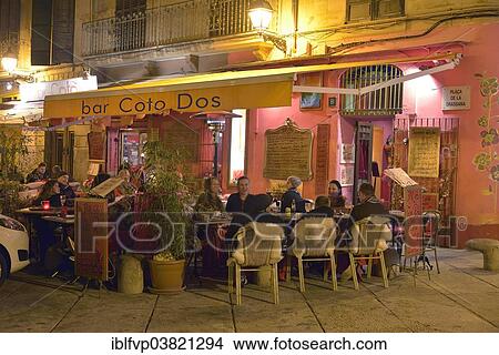 Guests Dining Outdoors At The Tapas Bar Bar Coto Dos In The Entertainment District Of La Lonja In The Evening Palma Mallorca Balearic Islands Spain Europe Picture Iblfvp Fotosearch