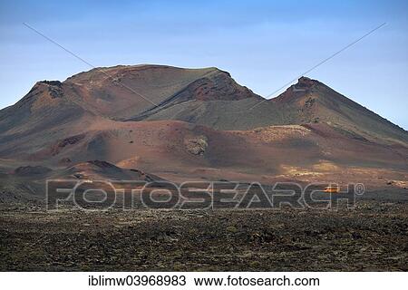 Stock Image - "Guided bus tour through the Montanas del Fuego, Timanfaya National Park, Lanzarote, Canary Islands, Spain, Europe". Fotosearch