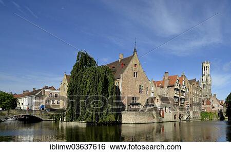 "Guild houses in front of the Belfort or Belfry of Bruges, bell tower, historic centre at Rozenhoedkaai, UNESCO World Heritage Site, Bruges, Flemish Region, Belgium, Europe" View Large Photo Image Stock Photograph - "Guild houses in front of the Belfort or Belfry of Bruges, bell tower, historic centre at Rozenhoedkaai, UNESCO World Heritage Site, Bruges, Flemish Region, Belgium, Europe". Fotosearch