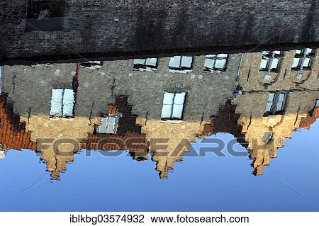 "Guild houses with stepped gables being reflected in Dijver canal, Bruges, West Flanders, Flemish Region, Belgium, Europe" View Large Photo Image Stock Image - "Guild houses with stepped gables being reflected in Dijver canal, Bruges, West Flanders, Flemish Region, Belgium, Europe". Fotosearch