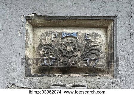 "Guild sign above the entrance of the former Wolfsgrubermuhle, a water mill from 1737, on the Pegnitz River, Furth, Middle Franconia, Bavaria, Germany, Europe" View Large Photo Image Picture - "Guild sign above the entrance of the former Wolfsgrubermuhle, a water mill from 1737, on the Pegnitz River, Furth, Middle Franconia, Bavaria, Germany, Europe". Fotosearch