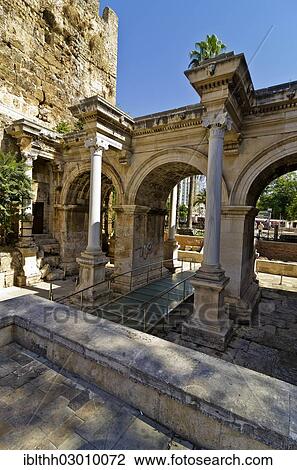 Stock Image - "Hadrian's Gate or Gate of Hadrian, in honour of the Roman Emperor Hadrian, built in 130 AD, Kaleici district, Kaleici, Antalya, Antalya Province, Turkey, Asia". Fotosearch