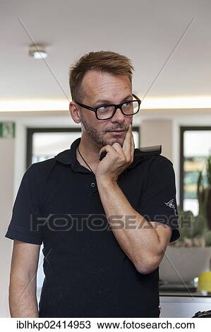 Hairdresser with a questioning look View Large Photo Image Stock Image - Hairdresser with a questioning look. Fotosearch
