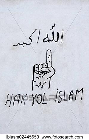 "Hak Yol Islam, writing in Turkish and Arabic, translate to """"Islam, the right way"""", hand with a pointing finger on a house wall, Istanbul, Turkey, Asia" View Large Photo Image Stock Image - "Hak Yol Islam, writing in Turkish and Arabic, translate to """"Islam, the right way"""", hand with a pointing finger on a house wall, Istanbul, Turkey, Asia". Fotosearch