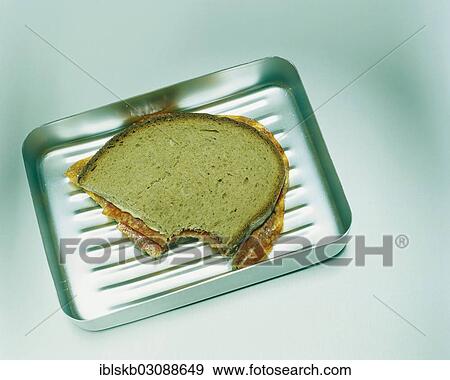 Half-eaten salami sandwich in an aluminium lunch box View Large Photo Image Stock Photo - Half-eaten salami sandwich in an aluminium lunch box. Fotosearch