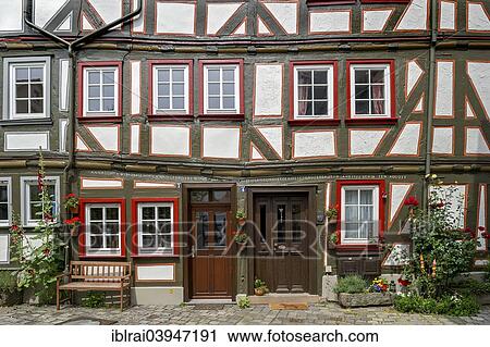 "Half-timbered house, decorated with flowers, Grabbrunnen, historic centre, Alsfeld, Hesse, Germany, Europe" View Large Photo Image Stock Image - "Half-timbered house, decorated with flowers, Grabbrunnen, historic centre, Alsfeld, Hesse, Germany, Europe". Fotosearch