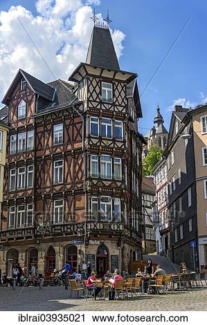 "Half-timbered house """"Deutsches Haus"""", market square, St Mary's Church at the back, historic centre, Marburg, Hesse, Germany, Europe" View Large Photo Image Stock Image - "Half-timbered house """"Deutsches Haus"""", market square, St Mary's Church at the back, historic centre, Marburg, Hesse, Germany, Europe". Fotosearch