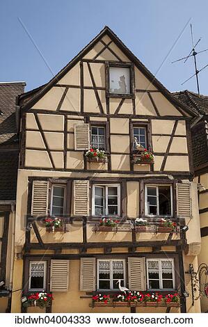 "Half-timbered house with stork figures in the historic centre, Colmar, Alsace, France, Europe" View Large Photo Image Stock Image - "Half-timbered house with stork figures in the historic centre, Colmar, Alsace, France, Europe". Fotosearch
