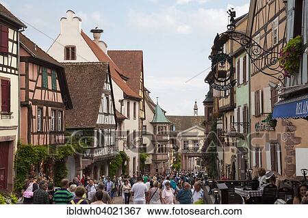 "Half-timbered houses and tourists in the Rue du General du Gaulle, Riquewihr, Alsace, France, Europe" View Large Photo Image Stock Photo - "Half-timbered houses and tourists in the Rue du General du Gaulle, Riquewihr, Alsace, France, Europe". Fotosearch