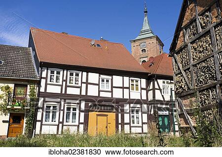 "Half-timbered houses in front of the tower of St. Catherine's Church, Lenzen Elbe, Brandenburg, Germany, Europe" View Large Photo Image Stock Image - "Half-timbered houses in front of the tower of St. Catherine's Church, Lenzen Elbe, Brandenburg, Germany, Europe". Fotosearch