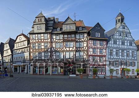 "Half-timbered houses with the former inn """"Zum Goldenen Lowen"""" with the Old Town Hall, market square, Butzbach, Hesse, Germany, Europe" View Large Photo Image Stock Photography - "Half-timbered houses with the former inn """"Zum Goldenen Lowen"""" with the Old Town Hall, market square, Butzbach, Hesse, Germany, Europe". Fotosearch