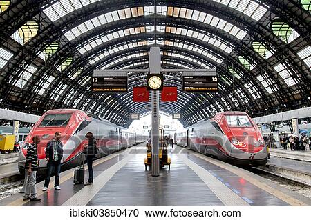 "Hall in the central railway station, Stazione Centrale, with Frecciarossa high-speed trains, Milan, Lombardy, Italy, Europe" View Large Photo Image Stock Image - "Hall in the central railway station, Stazione Centrale, with Frecciarossa high-speed trains, Milan, Lombardy, Italy, Europe". Fotosearch