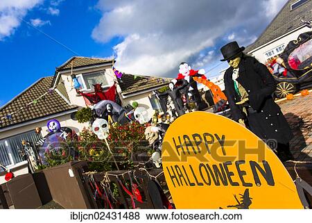 "Halloween decorations in the front yard of a house in Milford Haven, Pembrokeshire, Wales, United Kingdom, Europe" View Large Photo Image Stock Photo - "Halloween decorations in the front yard of a house in Milford Haven, Pembrokeshire, Wales, United Kingdom, Europe". Fotosearch