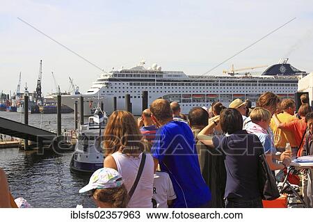 "Hamburg harbour, tourists looking at the entering cruise ship MSC Lirica, Hanseatic City of Hamburg, Germany, Europe" View Large Photo Image Stock Image - "Hamburg harbour, tourists looking at the entering cruise ship MSC Lirica, Hanseatic City of Hamburg, Germany, Europe". Fotosearch