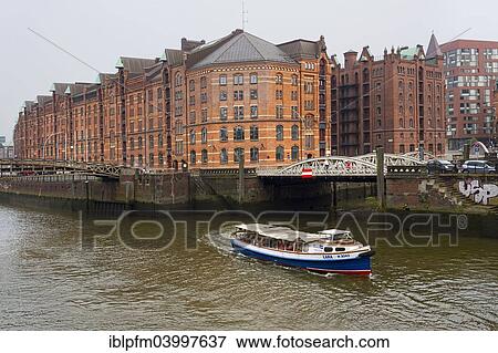 "Hamburg Port Authority building, tourist boat on the Elbe water canal, Speicherstadt, Hamburg, Germany, Europe" View Large Photo Image Stock Photo - "Hamburg Port Authority building, tourist boat on the Elbe water canal, Speicherstadt, Hamburg, Germany, Europe". Fotosearch