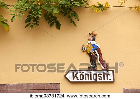 "Hand-crafted street sign """"Koenigstr. """" with a king, Enkirch, Rhineland-Palatinate, Germany, Europe" View Large Photo Image Picture - "Hand-crafted street sign """"Koenigstr. """" with a king, Enkirch, Rhineland-Palatinate, Germany, Europe". Fotosearch