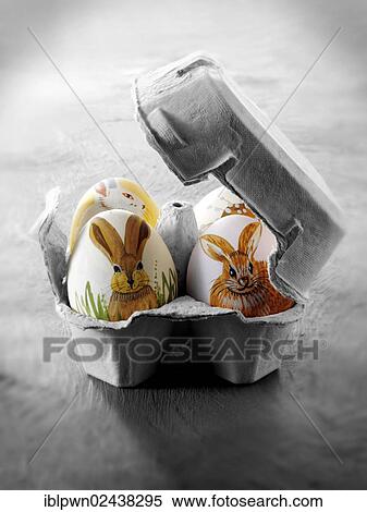 Hand-painted eggs with traditional Easter bunny design in egg box View Large Photo Image Stock Photography - Hand-painted eggs with traditional Easter bunny design in egg box. Fotosearch