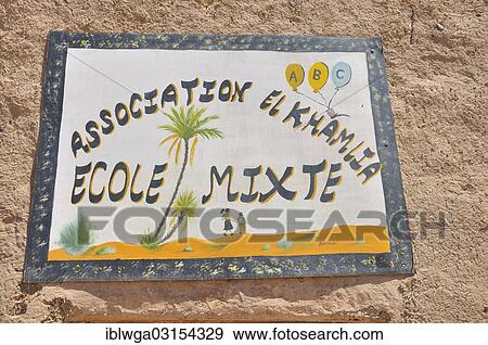 "Hand painted sign of a school, Merzouga, Meknes-Tafilalet region, Morocco, Africa" View Large Photo Image Stock Photo - "Hand painted sign of a school, Merzouga, Meknes-Tafilalet region, Morocco, Africa". Fotosearch