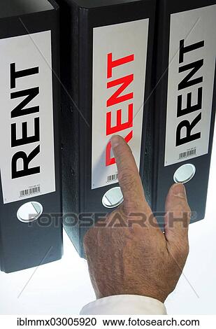 "Hand pointing to a file folder labeled """"Rent""""" View Large Photo Image Stock Image - "Hand pointing to a file folder labeled """"Rent""""". Fotosearch