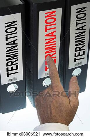 "Hand pointing to a file folder labeled """"Termination""""" View Large Photo Image Stock Image - "Hand pointing to a file folder labeled """"Termination""""". Fotosearch