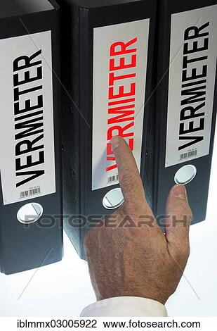 "Hand pointing to a file folder labeled """"Vermieter"""", German for """"Landlord""""" View Large Photo Image Stock Image - "Hand pointing to a file folder labeled """"Vermieter"""", German for """"Landlord""""". Fotosearch