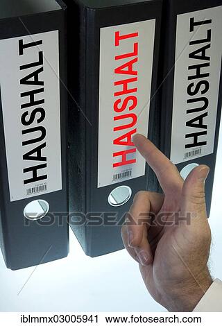 "Hand pointing to a file folder labeled """"Haushalt"""", German for """"housekeeping"""" or """"budget""""" View Large Photo Image Stock Image - "Hand pointing to a file folder labeled """"Haushalt"""", German for """"housekeeping"""" or """"budget""""". Fotosearch